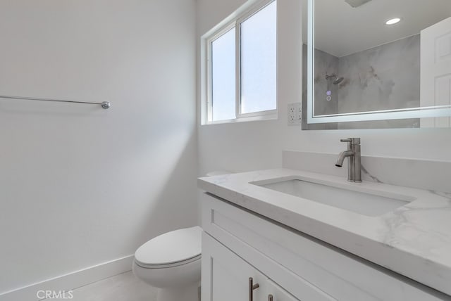 full bathroom with recessed lighting, walk in shower, toilet, vanity, and baseboards
