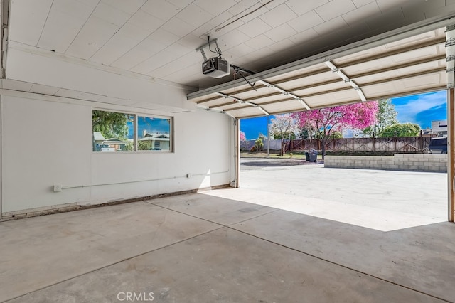 garage featuring a garage door opener