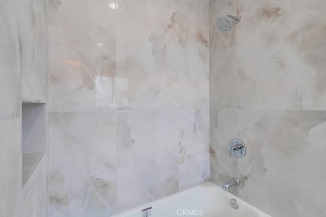 bathroom featuring bathtub / shower combination