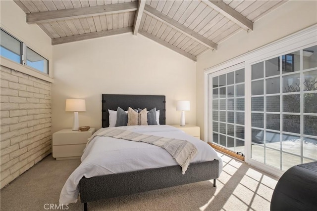 bedroom with lofted ceiling with beams, wooden ceiling, and carpet