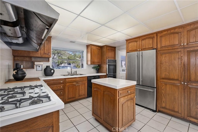 kitchen with light tile patterned flooring, brown cabinetry, ventilation hood, and black appliances