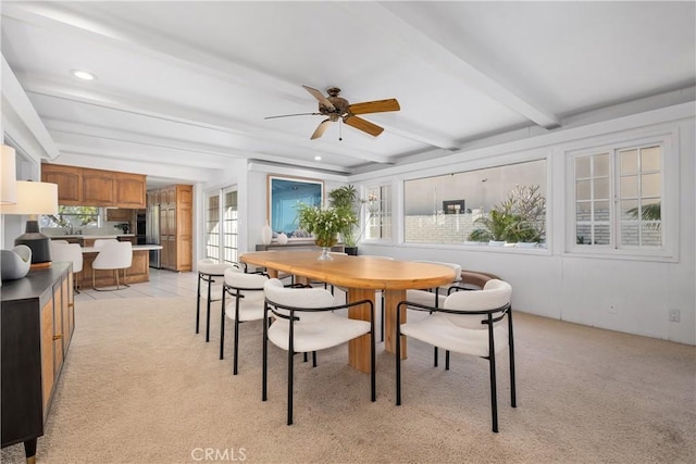 dining room with beamed ceiling, a ceiling fan, recessed lighting, and light carpet
