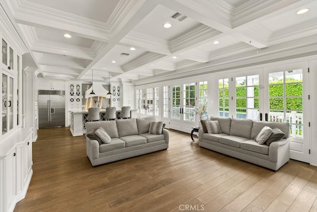 sunroom featuring french doors, beam ceiling, and coffered ceiling