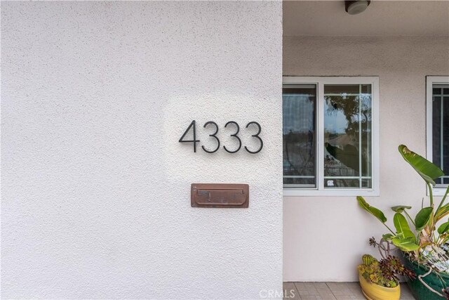 exterior details with stucco siding