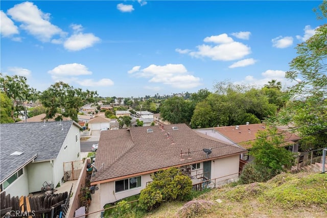 birds eye view of property with a residential view