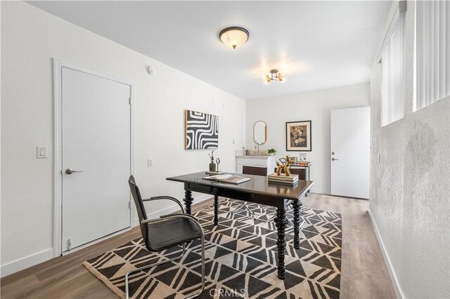 home office featuring wood finished floors