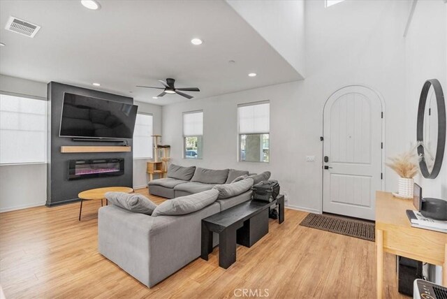 16452 Globetrotter Ave, Chino, CA 91708 - living area featuring ceiling fan, recessed lighting, light wood-style flooring, and visible vents
