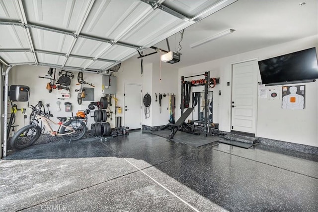 16452 Globetrotter Ave, Chino, CA 91708 - garage featuring a garage door opener and electric panel