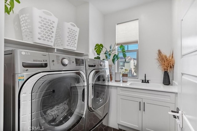 16452 Globetrotter Ave, Chino, CA 91708 - laundry area featuring a sink, separate washer and dryer, and cabinet space