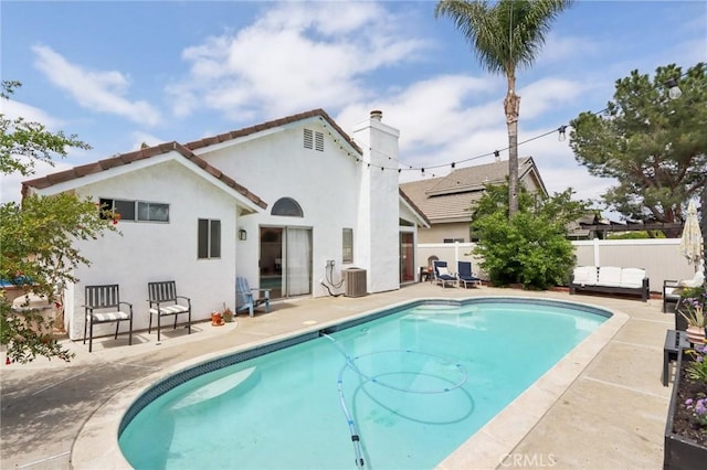 view of pool with fence, a fenced in pool, and a patio area