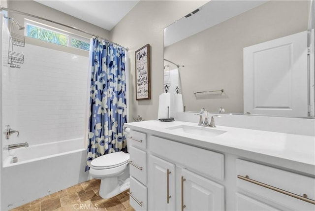 29102 Carrotwood, Lake Elsinore, CA 92530 - full bathroom featuring vanity, shower / bath combo, and stone finish flooring
