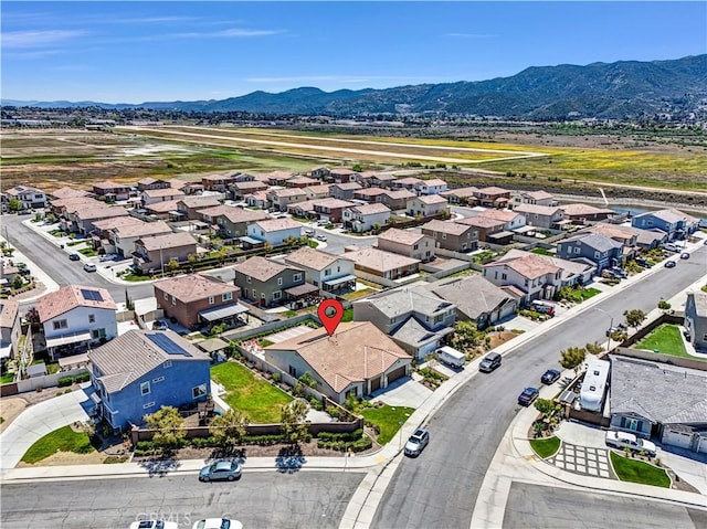 29102 Carrotwood, Lake Elsinore, CA 92530 - aerial perspective of suburban area featuring a mountain backdrop