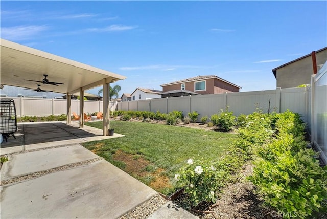 29102 Carrotwood, Lake Elsinore, CA 92530 - fenced backyard featuring a ceiling fan and a patio area