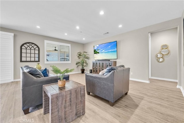 29102 Carrotwood, Lake Elsinore, CA 92530 - living room featuring light wood finished floors and recessed lighting