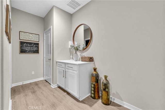 29102 Carrotwood, Lake Elsinore, CA 92530 - hall with light wood finished floors and baseboards