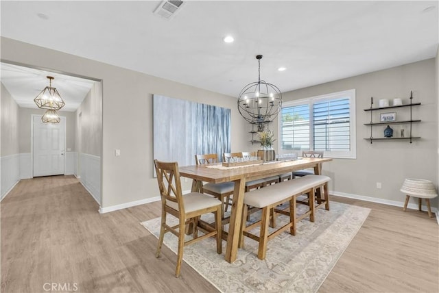 29102 Carrotwood, Lake Elsinore, CA 92530 - dining room featuring a chandelier, light wood finished floors, recessed lighting, and a wainscoted wall