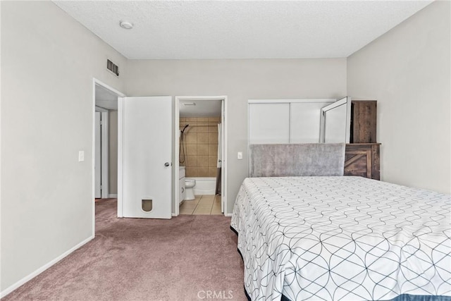 11150 Glenoaks Blvd Unit 98, Pacoima, CA 91331 - bedroom featuring baseboards, visible vents, a textured ceiling, and carpet flooring