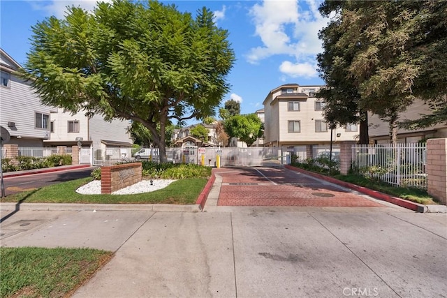 11150 Glenoaks Blvd Unit 98, Pacoima, CA 91331 - exterior space featuring fence and a residential view