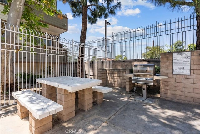 11150 Glenoaks Blvd Unit 98, Pacoima, CA 91331 - view of patio / terrace with fence and area for grilling