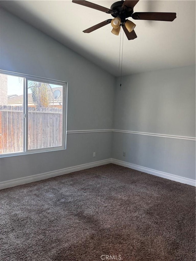 1912 W Quartermaster St, Colton, CA 92324 - empty room with carpet flooring, vaulted ceiling, and a ceiling fan