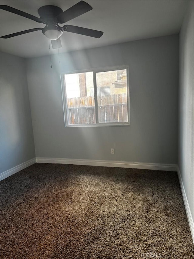 1912 W Quartermaster St, Colton, CA 92324 - carpeted spare room with ceiling fan and baseboards