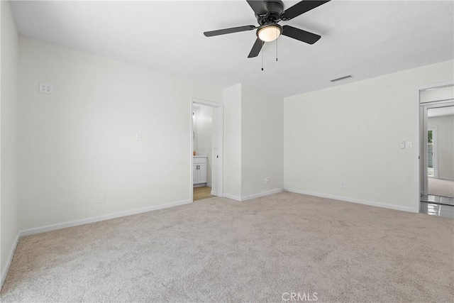 67305 Verona Rd, Cathedral City, CA 92234 - empty room featuring carpet floors, baseboards, and a ceiling fan