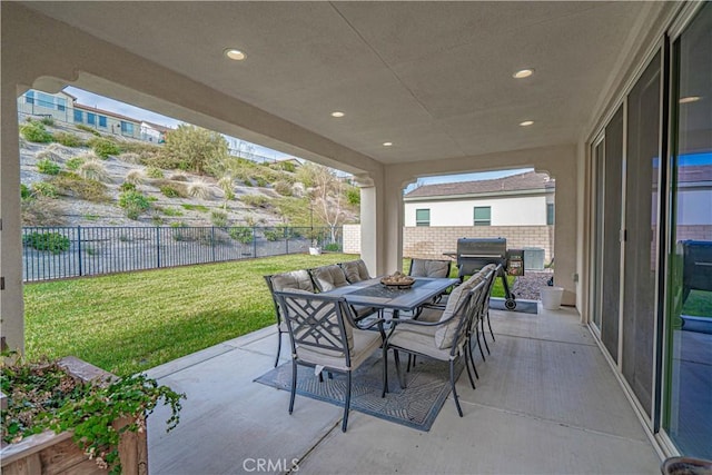 view of patio / terrace featuring a fenced backyard and outdoor dining area