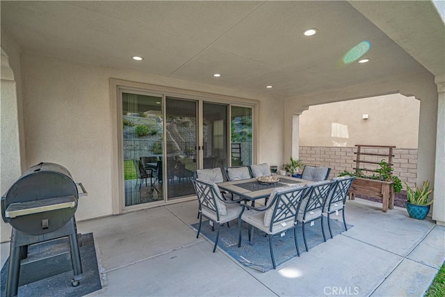 view of patio / terrace with fence and outdoor dining space