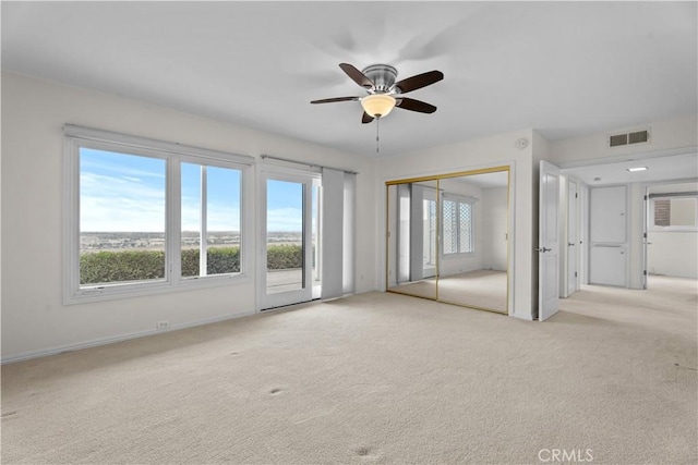 4101 Paseo De Las Tortugas, Torrance, CA 90505 - unfurnished bedroom with light colored carpet, a closet, a ceiling fan, and baseboards