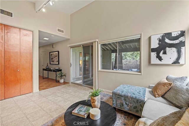 527 Bradford St, Pasadena, CA 91105 - living room featuring track lighting, a towering ceiling, and visible vents