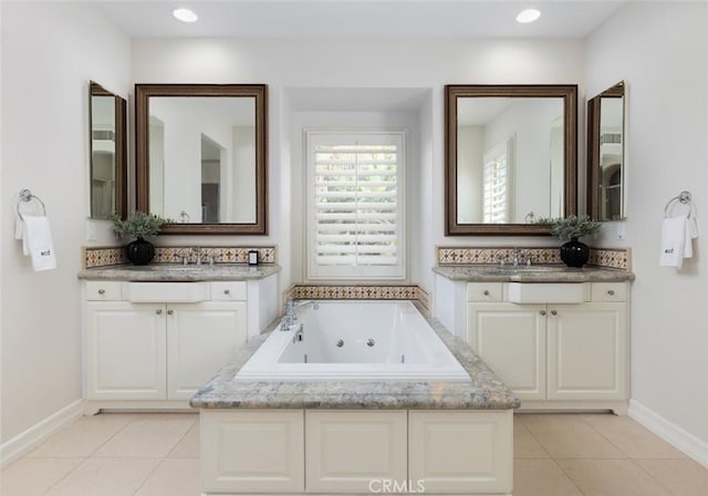 26 Via Fontibre, San Clemente, CA 92673 - bathroom with a tub with jets, vanity, tile patterned floors, baseboards, and recessed lighting