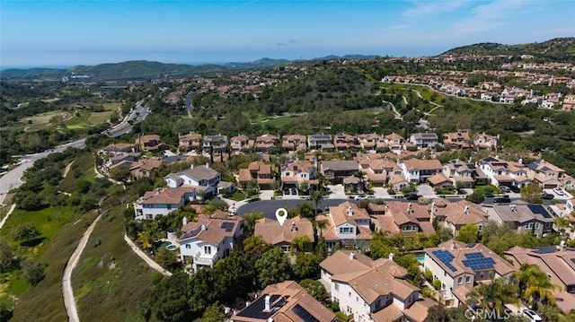 26 Via Fontibre, San Clemente, CA 92673 - aerial overview of property's location with nearby suburban area and a mountain backdrop