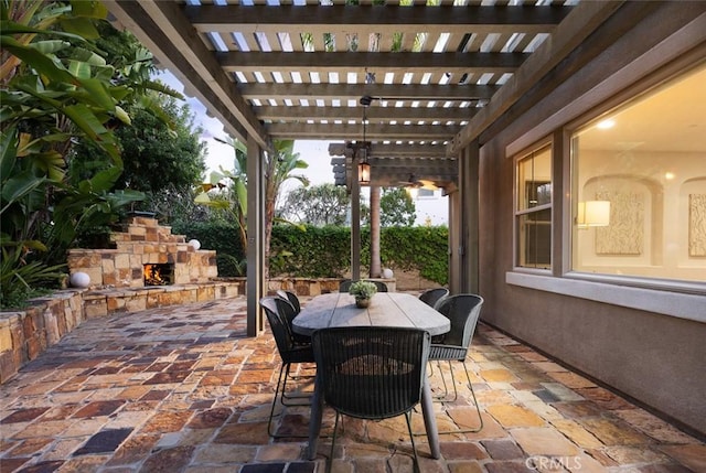 26 Via Fontibre, San Clemente, CA 92673 - view of patio with an outdoor stone fireplace, outdoor dining area, and a pergola