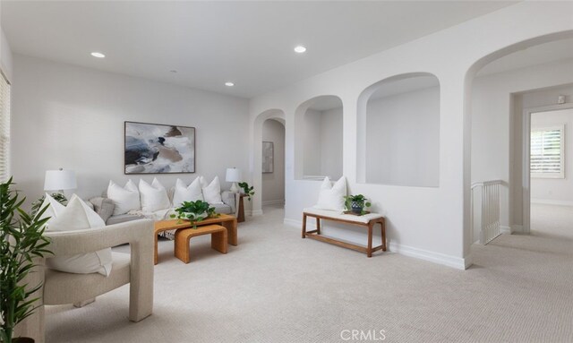 26 Via Fontibre, San Clemente, CA 92673 - carpeted living area with recessed lighting, baseboards, and arched walkways