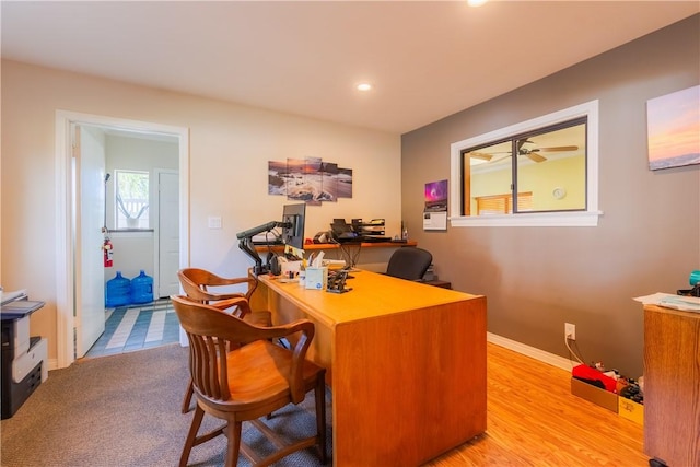 office space with recessed lighting, light wood finished floors, and baseboards