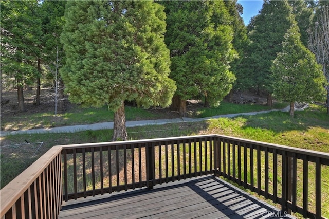 deck featuring a yard