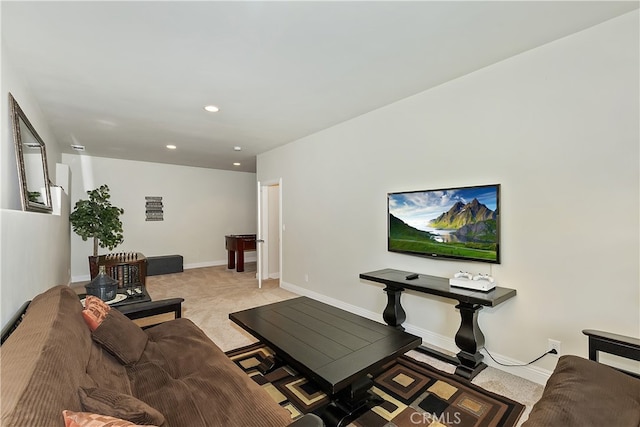 carpeted living room featuring recessed lighting and baseboards