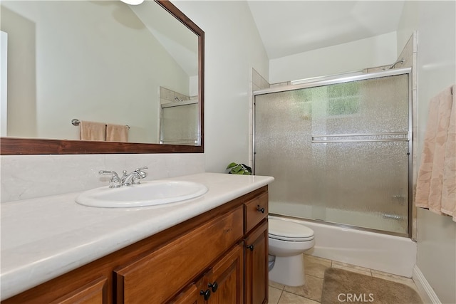 455 Clearwater Ln, Lake Arrowhead, CA 92352 - bathroom with vanity, bath / shower combo with glass door, vaulted ceiling, tile patterned flooring, and decorative backsplash