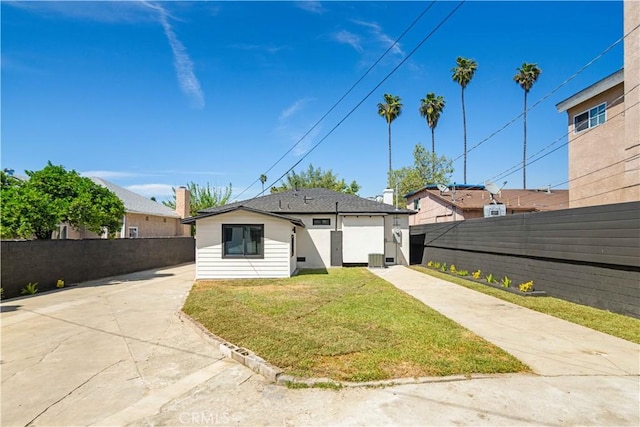4926 Templeton St, Los Angeles, CA 90032 - view of front of property with a front lawn, driveway, stucco siding, and fence