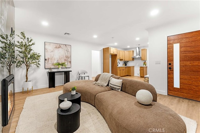 4926 Templeton St, Los Angeles, CA 90032 - living area featuring visible vents, recessed lighting, baseboards, and light wood-style floors