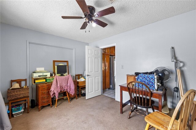 3406 Elm St, Bakersfield, CA 93301 - office area featuring a textured ceiling, a ceiling fan, and light carpet