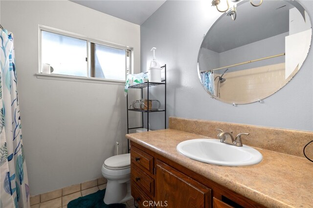 3406 Elm St, Bakersfield, CA 93301 - full bathroom featuring tile patterned floors, a shower with shower curtain, toilet, and vanity