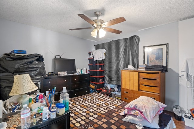 3406 Elm St, Bakersfield, CA 93301 - bedroom with a textured ceiling, wood finished floors, and ceiling fan