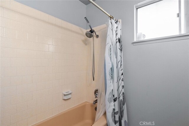 3406 Elm St, Bakersfield, CA 93301 - bathroom featuring shower / bath combo with shower curtain