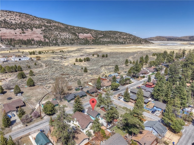 bird's eye view with a mountain view