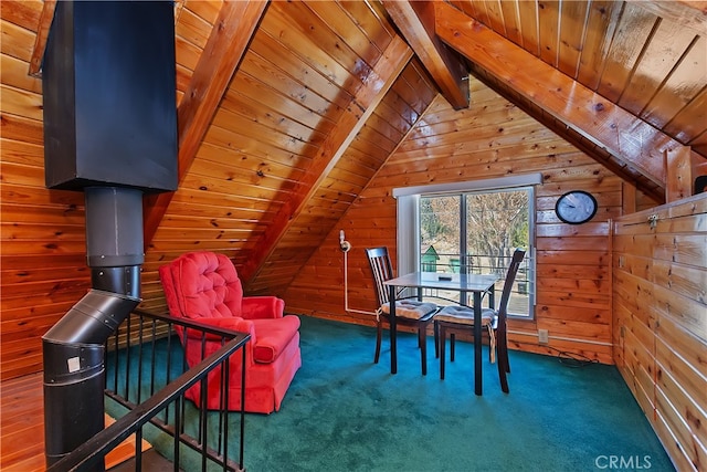 home office featuring wood walls, lofted ceiling with beams, carpet flooring, and wooden ceiling