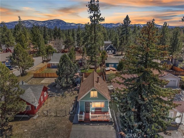 aerial view at dusk with a mountain view