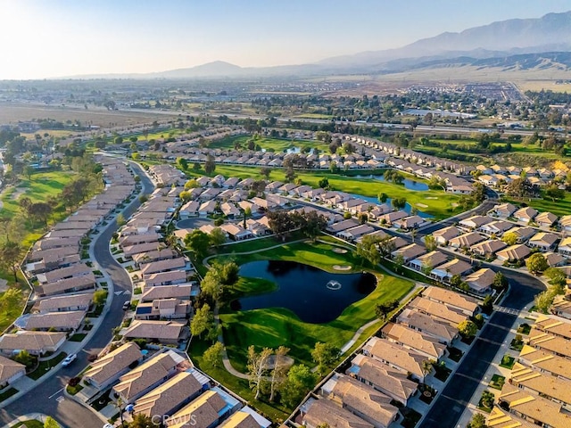 aerial view featuring a residential view and a water and mountain view