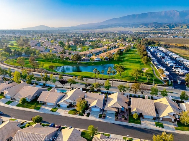 bird's eye view featuring a water and mountain view and a residential view