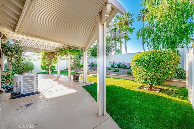 view of patio featuring a fenced backyard and central AC unit